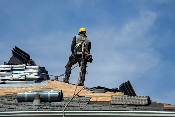Professional Roofing technician working in Oakham, MA